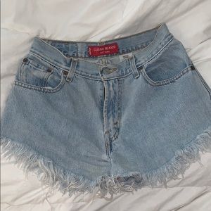 Levi’s high waist distressed Jean shorts